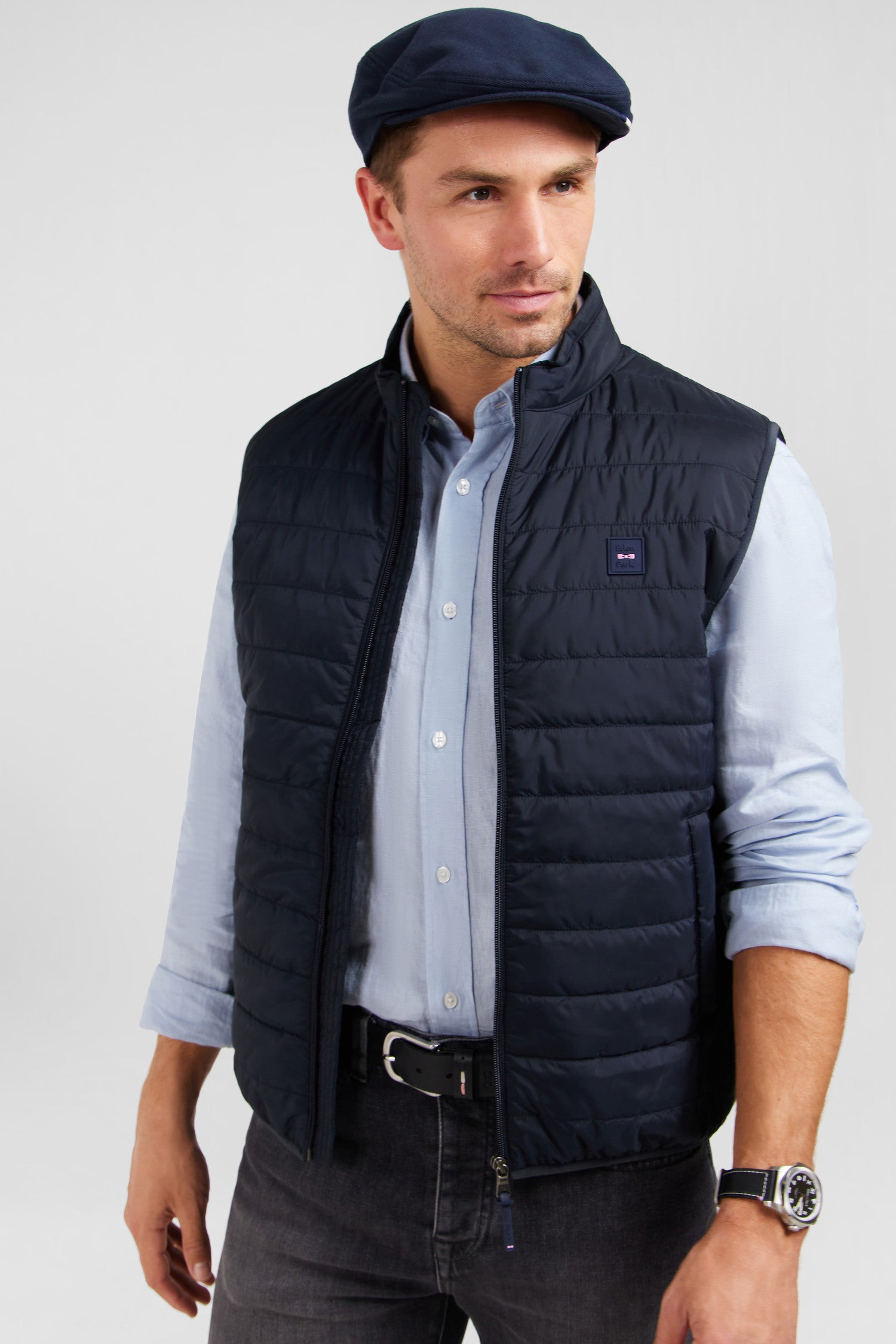 Navy blue sleeveless puffa jacket