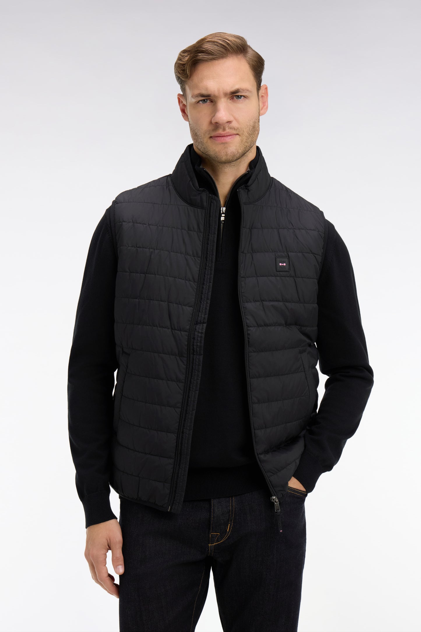 Black sleeveless down jacket