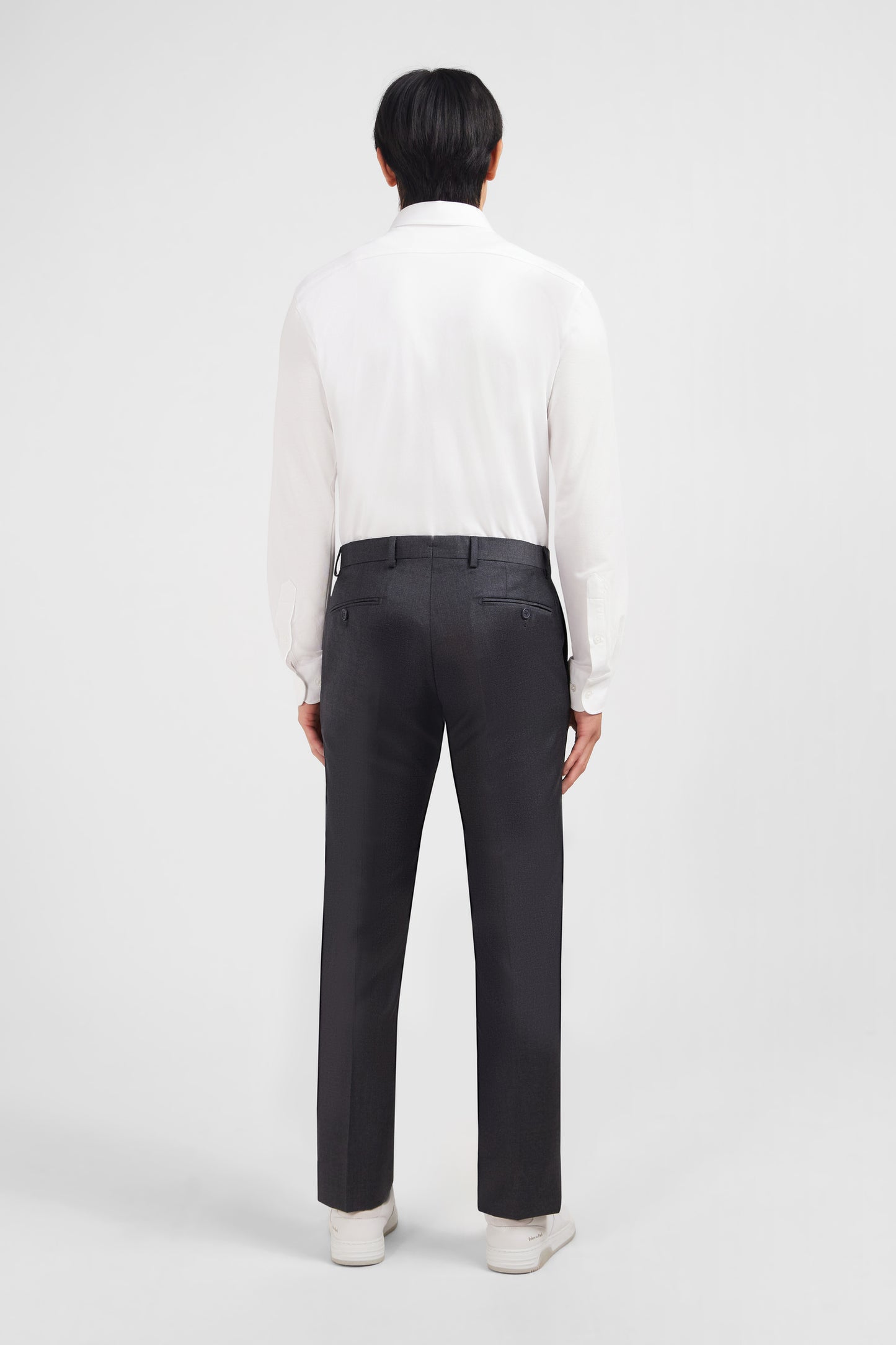 Pantalon slim gris en laine à plis cassés