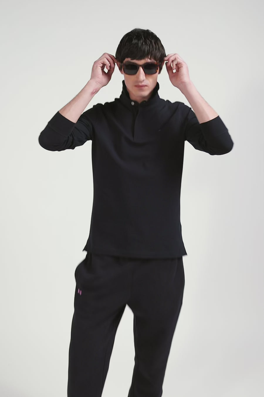 Slim black long-sleeved cotton piqué polo shirt