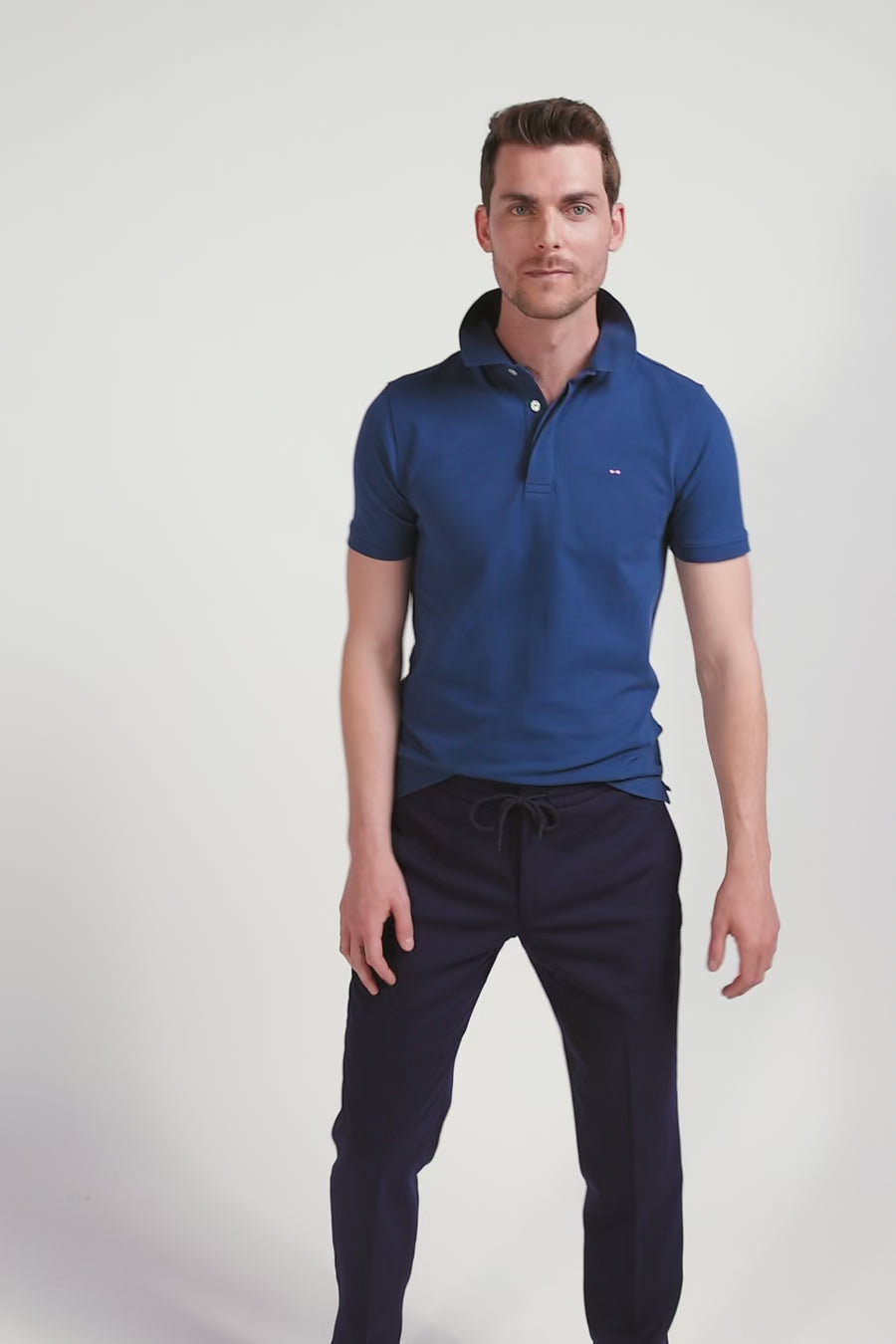 Slim dark blue short-sleeved stretch cotton polo shirt