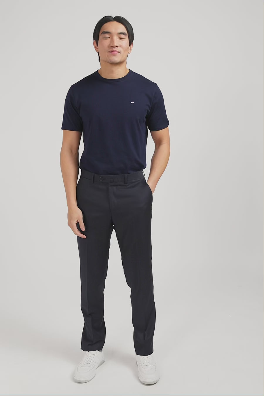 Regular dark grey wool trousers with broken fold