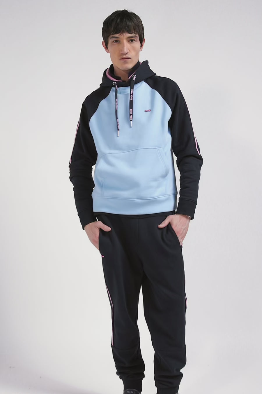 Relaxed navy and sky blue fleece hoodie with branded drawstrings