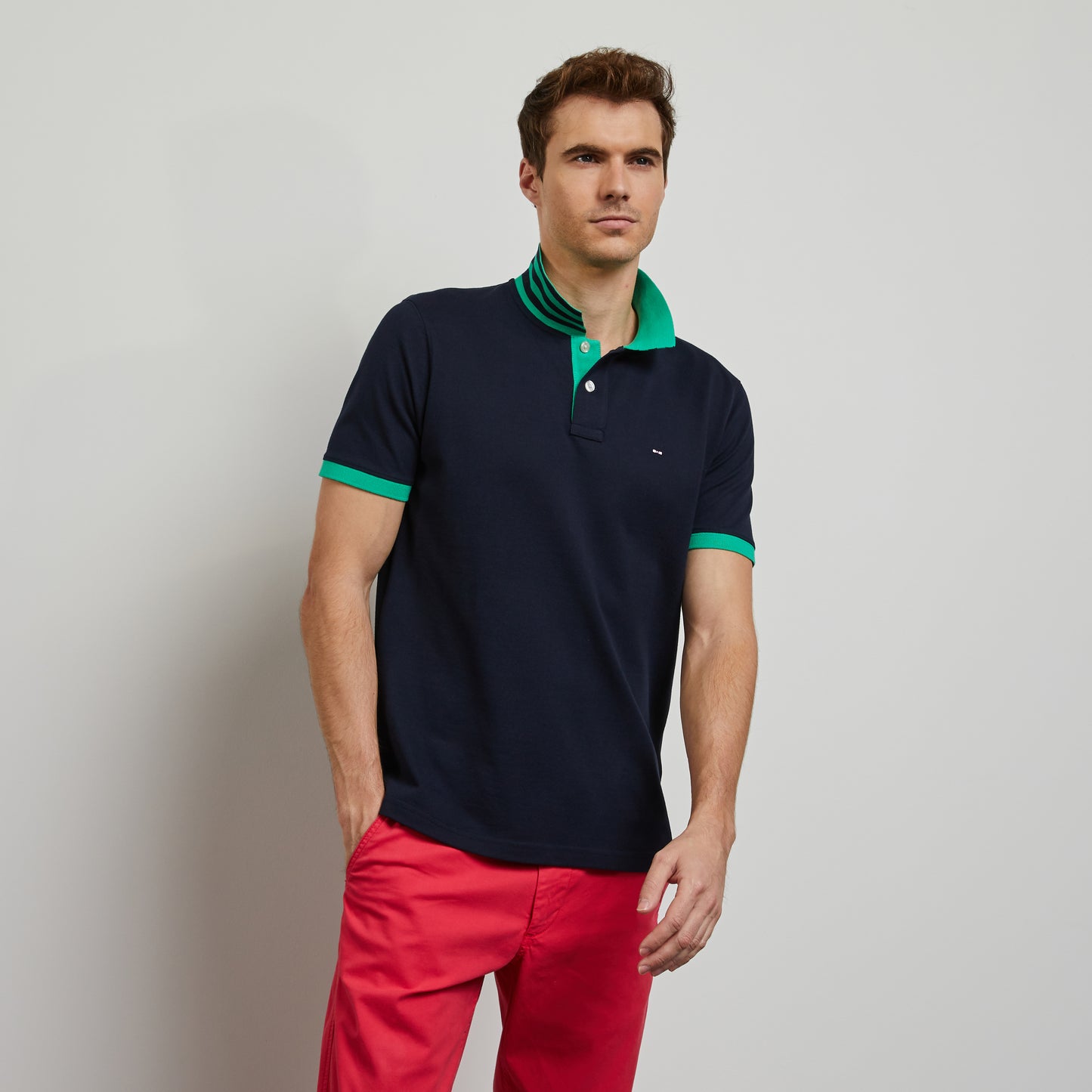 Dark blue polo with green trims, in Pima cotton