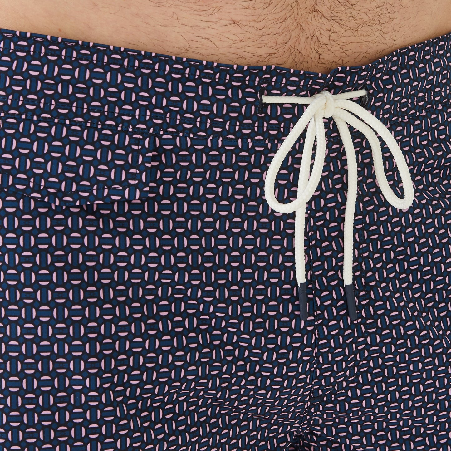 Pink swim shorts with micro motif