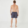 Pink swim shorts with micro motif