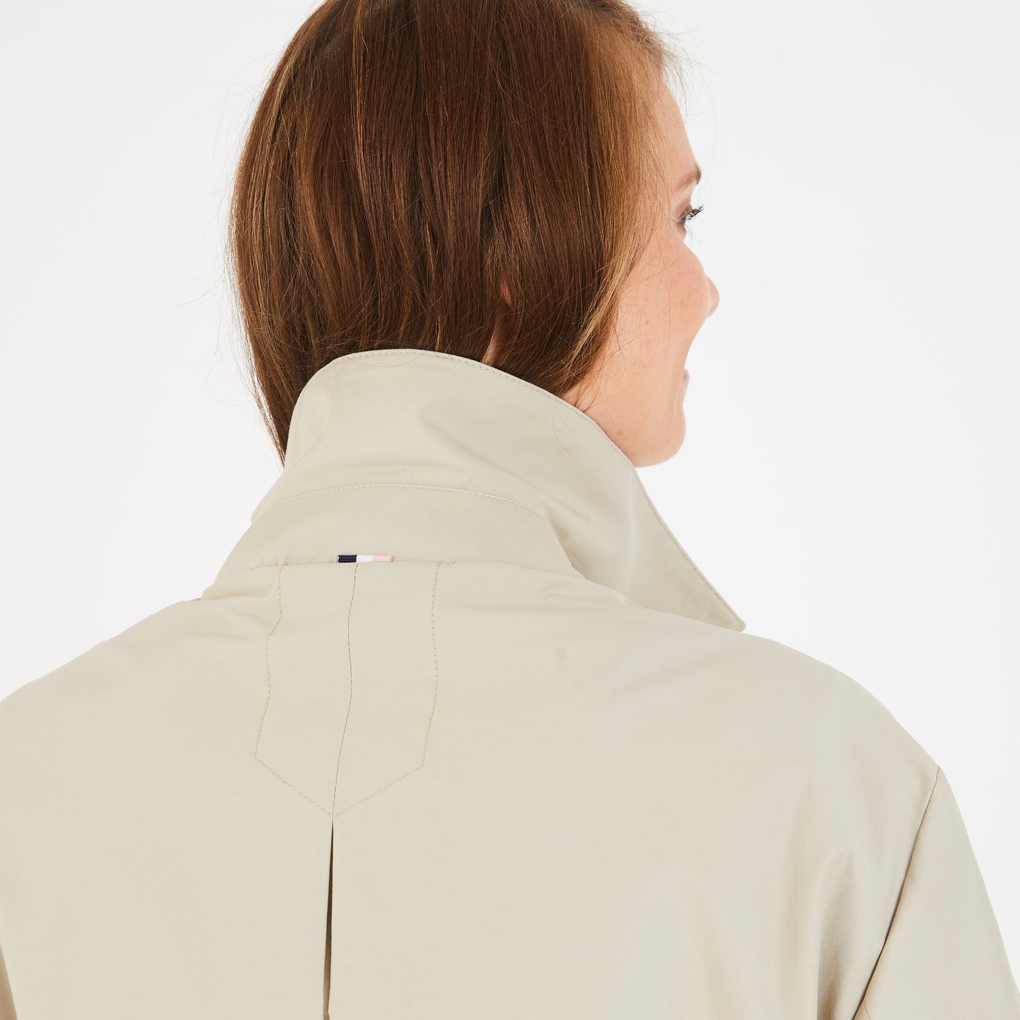 Beige raincoat with belt