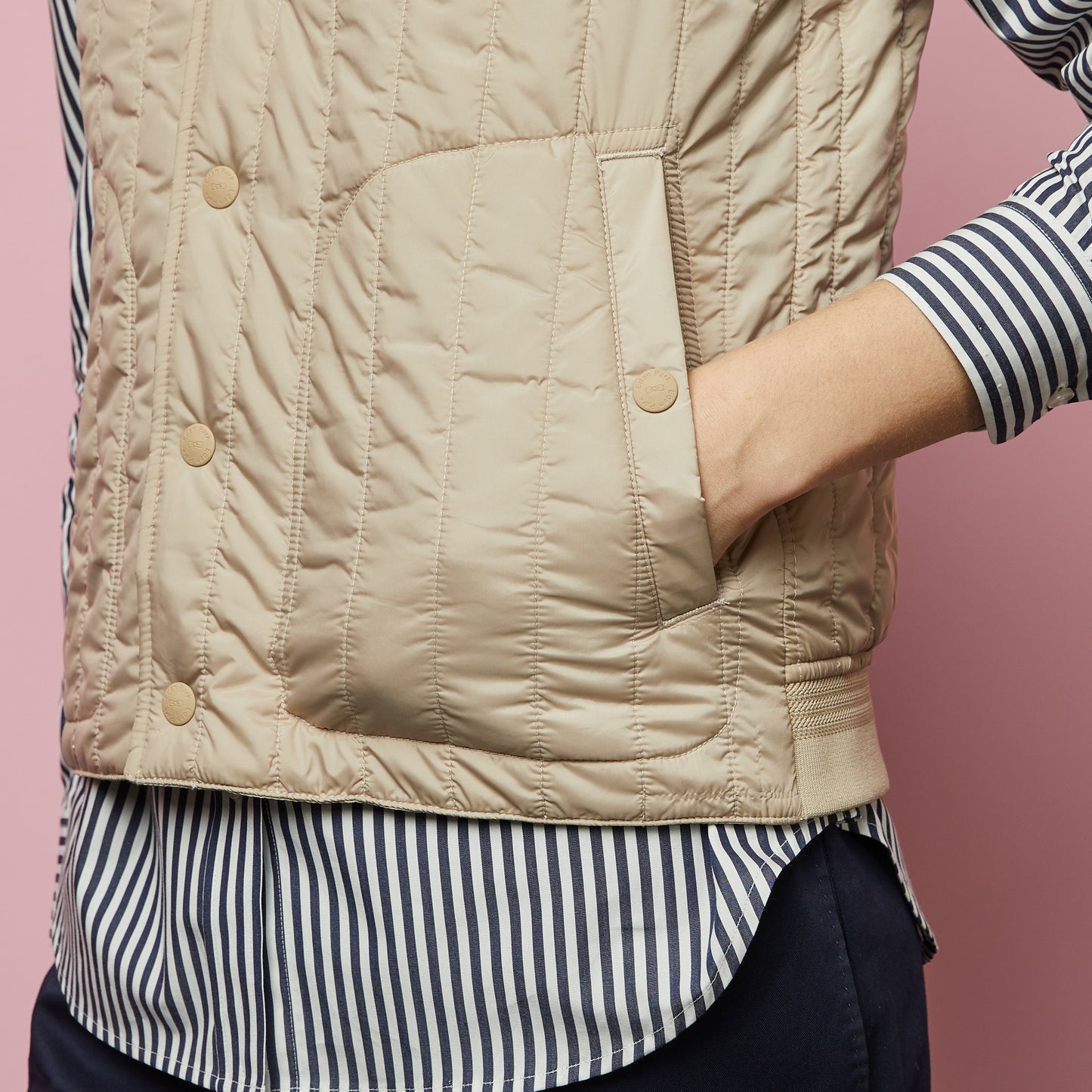 Beige sleeveless puffa jacket