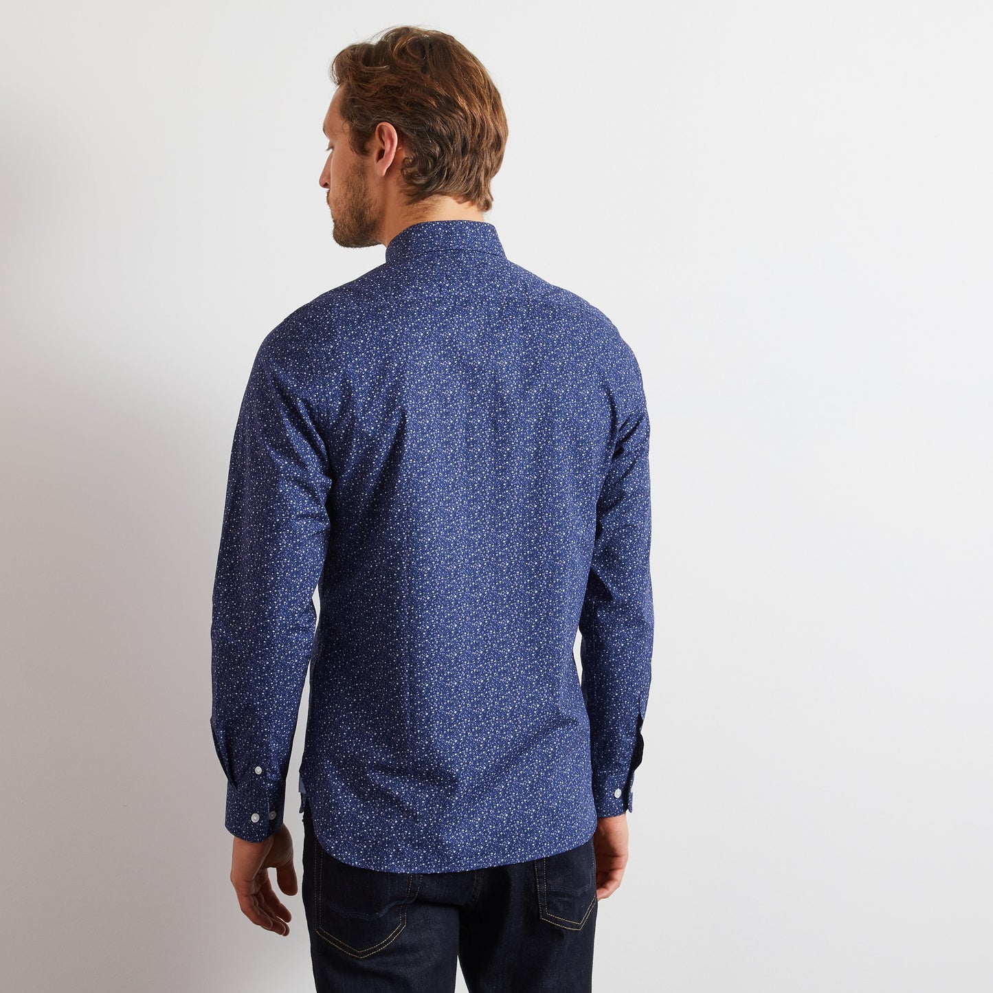 Navy blue shirt with a grey floral motif
