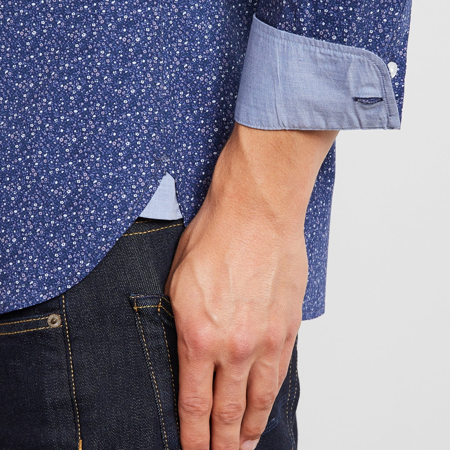 Navy blue shirt with a grey floral motif