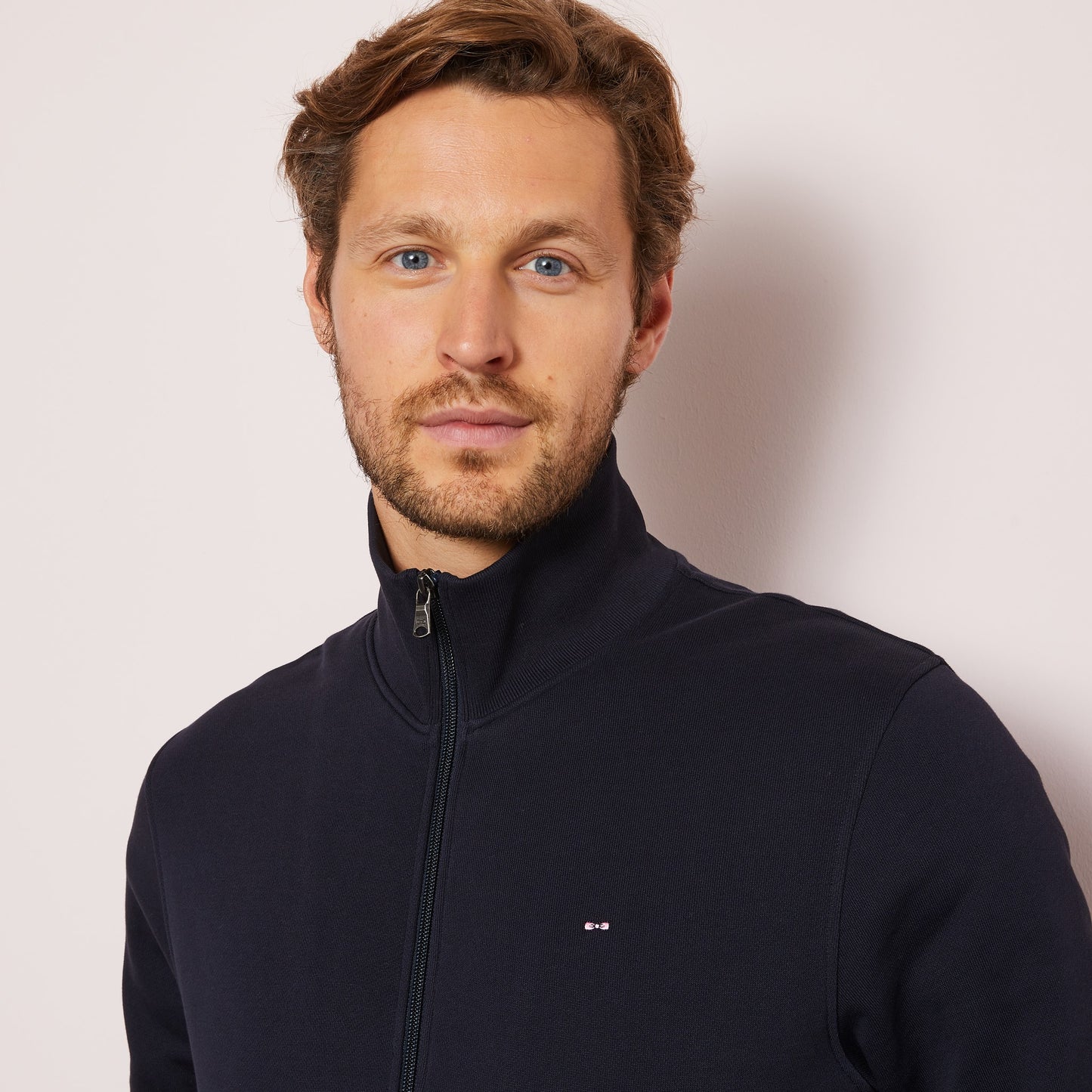 Navy blue zip sweatshirt with stand-up collar